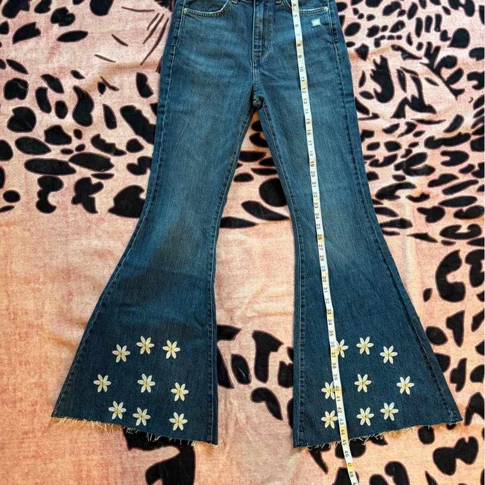 Forever 21 navy blue denim flare jeans with white floral embroidery